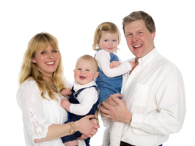 Soft indoor family portrait of mum and baby during Leicester studio shoot