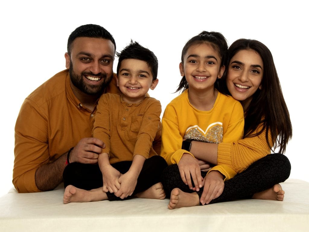 Family enjoying a relaxed portrait session at photoshoot studio Lutterworth