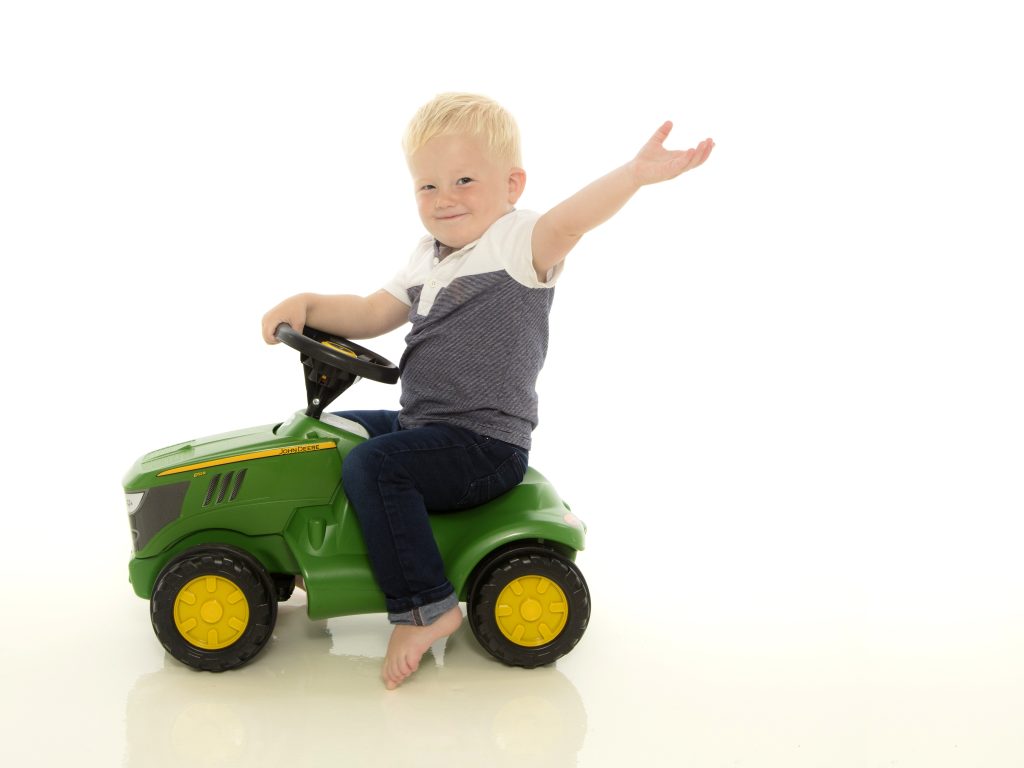 Smiling family enjoying a relaxed portrait at family portrait studios Lutterworth